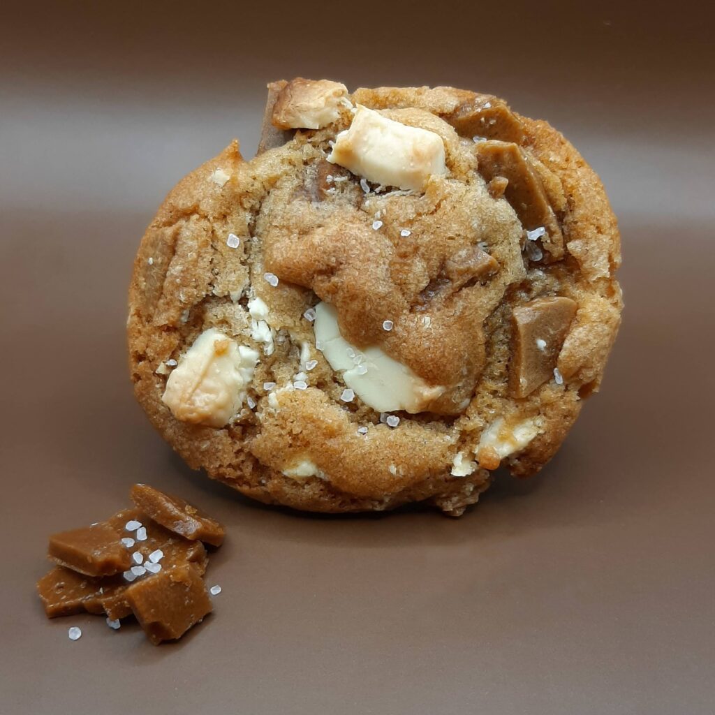 Delicious home-baked cookies. Vanilla cookie white choc caramel rock salt