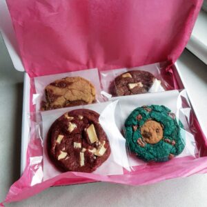 Delicious home-baked cookies - pink vanilla choc chip with party ring cookie